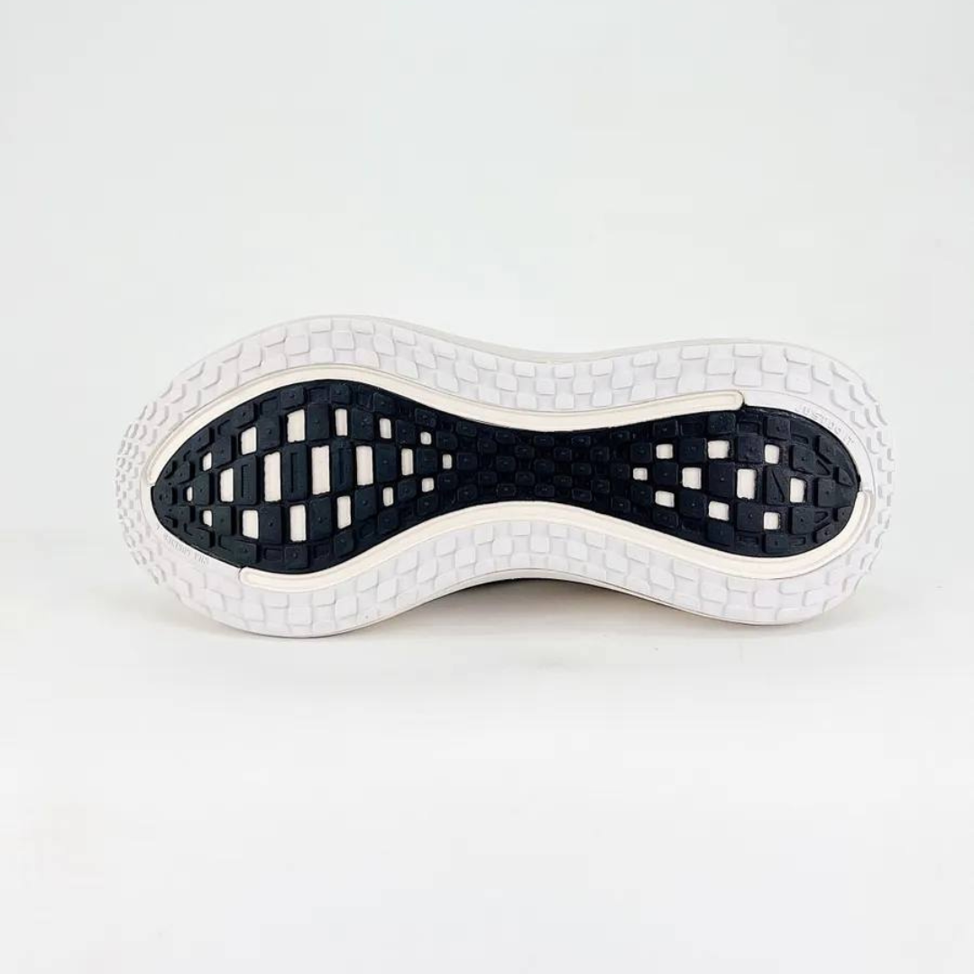 Tênis Nike Vomero Plus Run - Branco/Preto