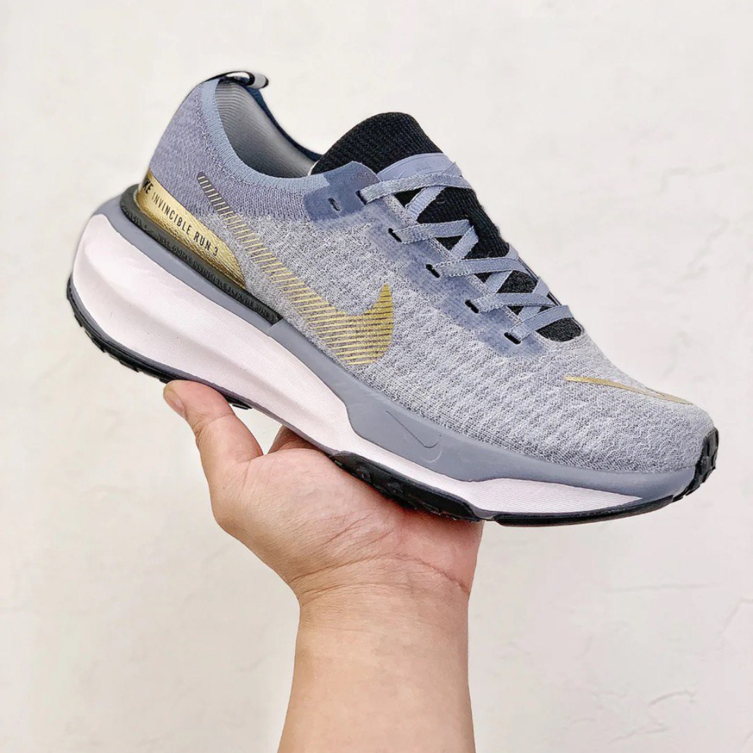 Tênis Nike Invincible Run 3 - Azul/Dourado