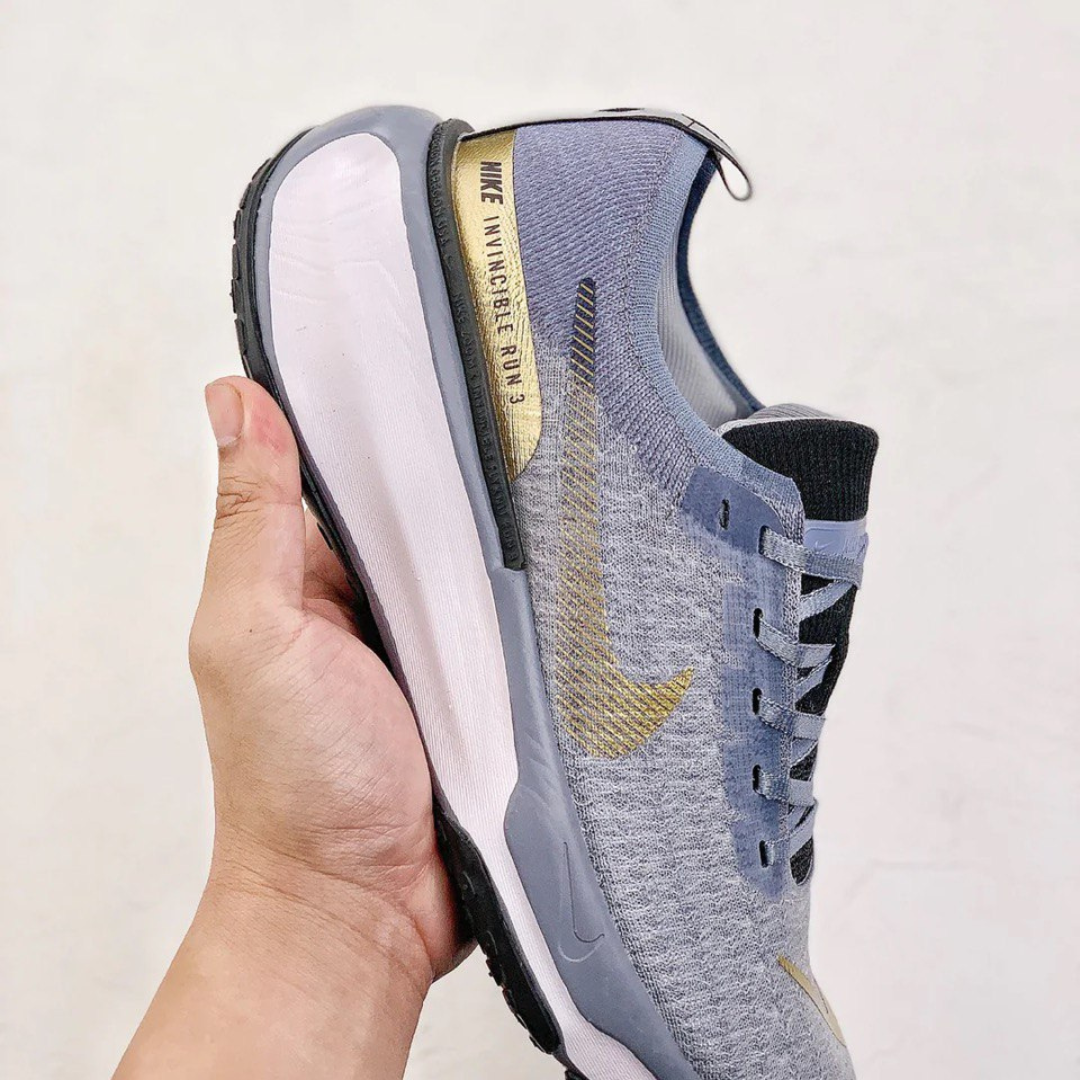 Tênis Nike Invincible Run 3 - Azul/Dourado