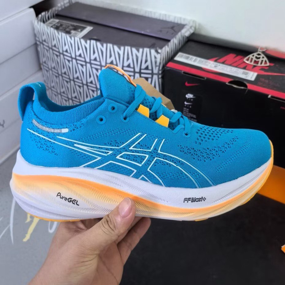 Tênis Asics Gel - Nimbus 26 - Azul e Laranja