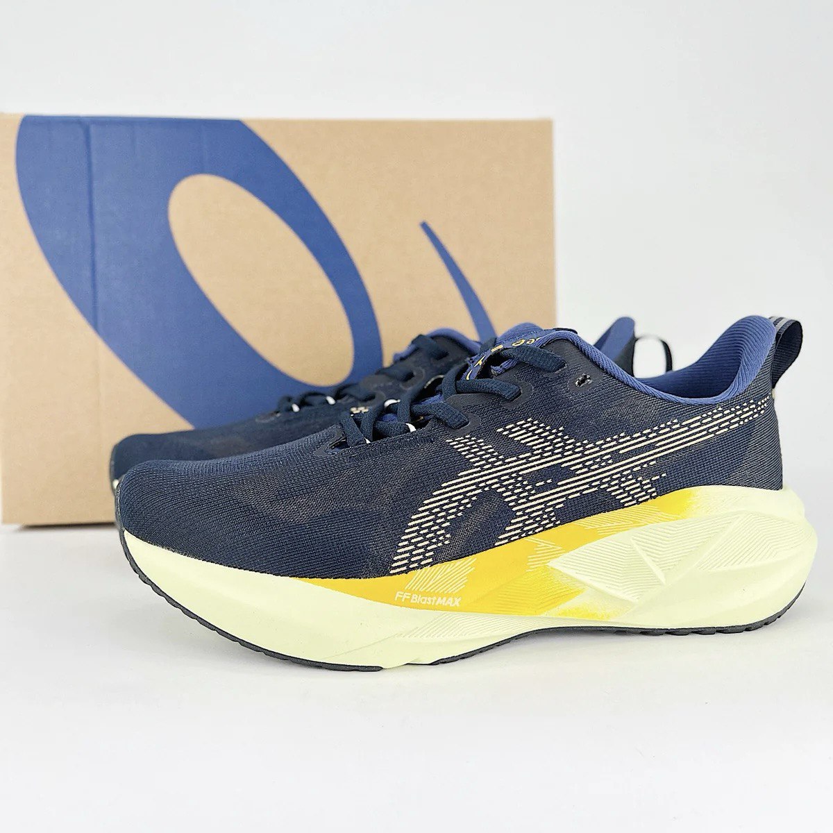 Tênis Asics Novablast 5 - Azul Marinho com Verde e Laranja