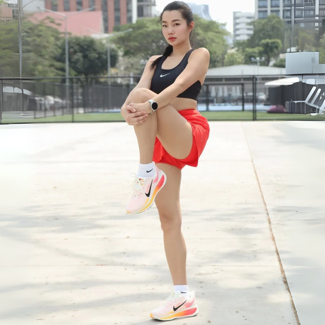 Tênis Nike Vomero 18 - Branco/Laranja