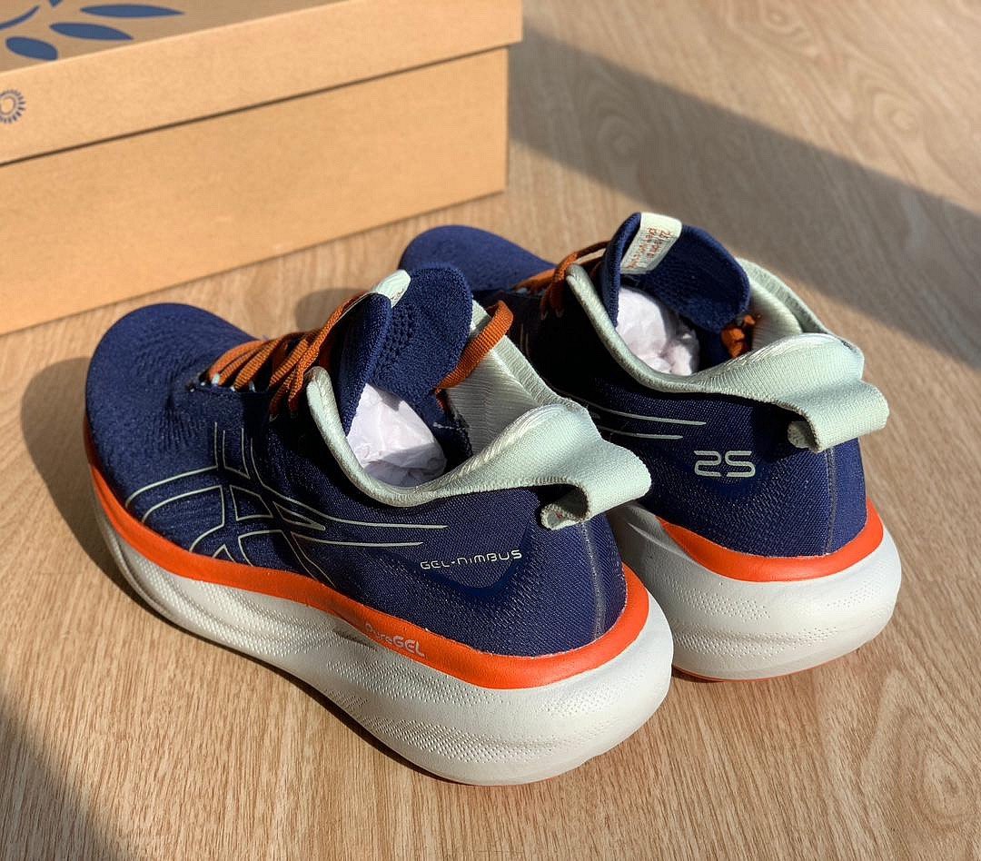 Tênis Asics Gel - Nimbus™ 25 Azul Marinho com Laranja e Branco