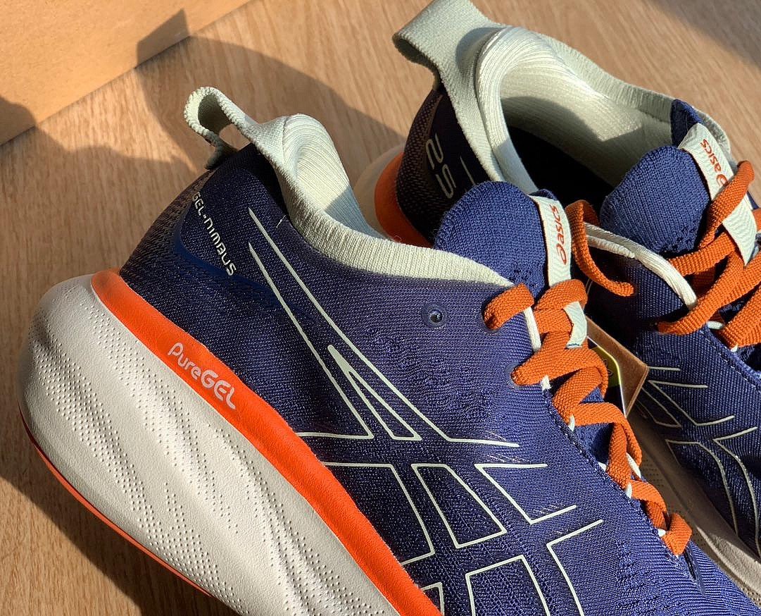 Tênis Asics Gel - Nimbus™ 25 Azul Marinho com Laranja e Branco